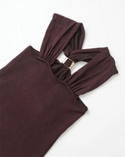 Close-up of the gold hardware on burgundy halter top