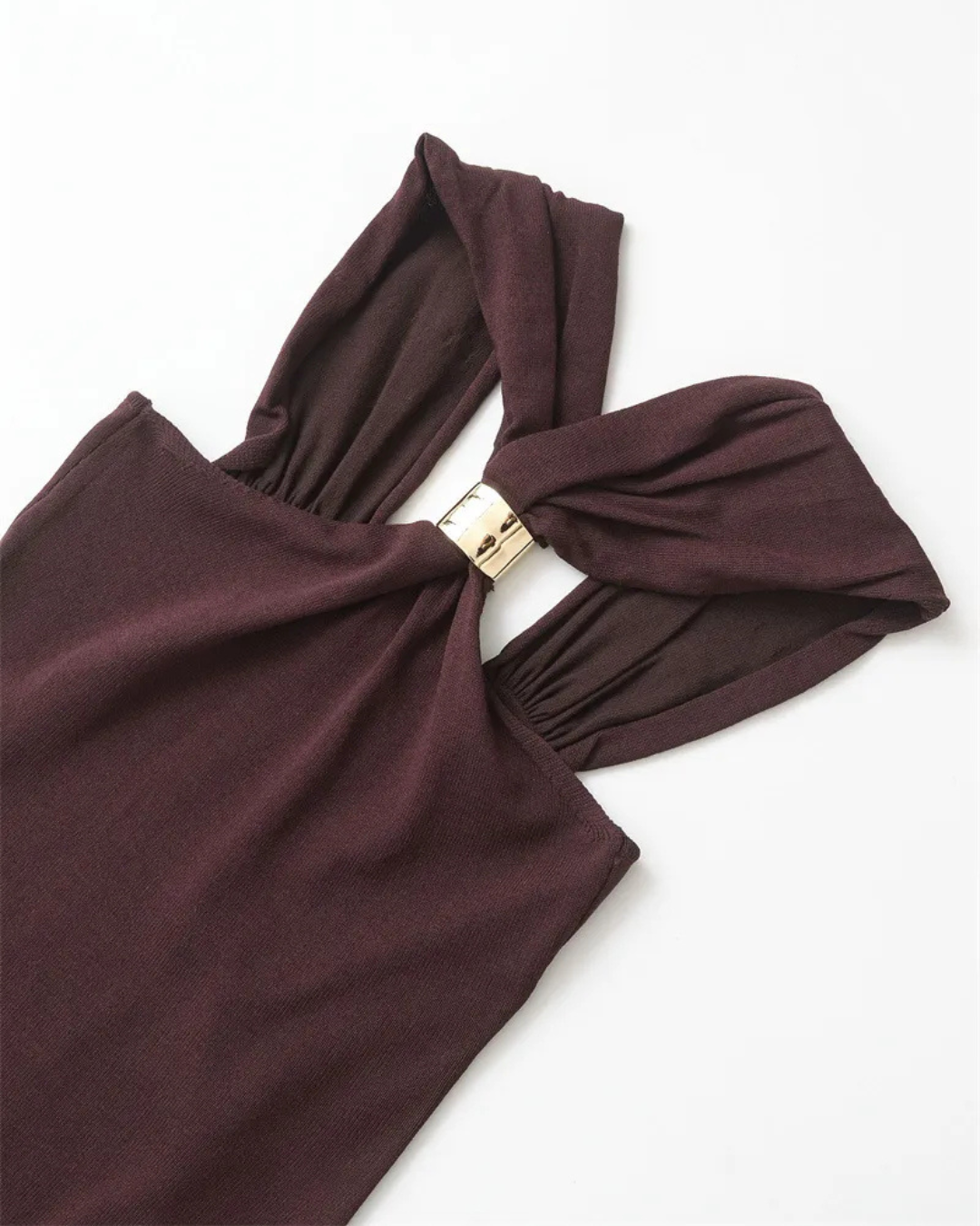 Detail of the criss-cross straps on burgundy halter top