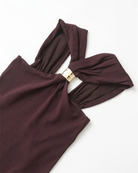 Detail of the criss-cross straps on burgundy halter top
