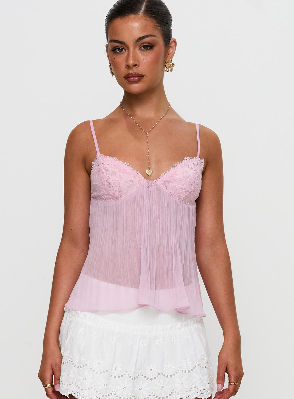 Pink lace pleated cami top, front view on model