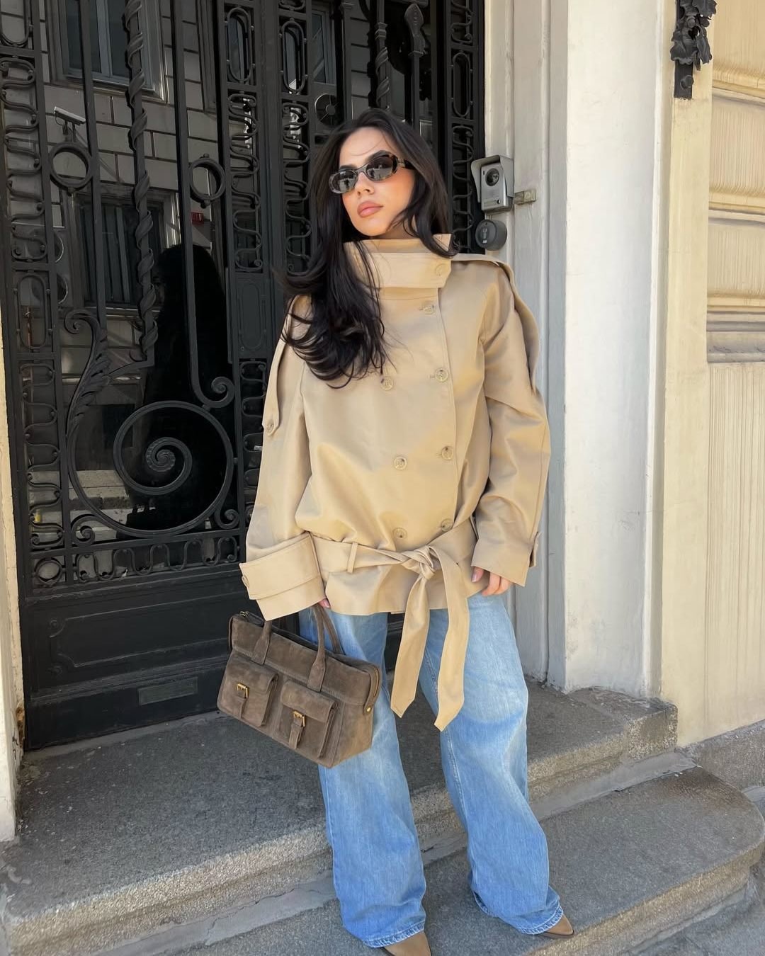 Camel cropped trench coat with wide collar, front view on model